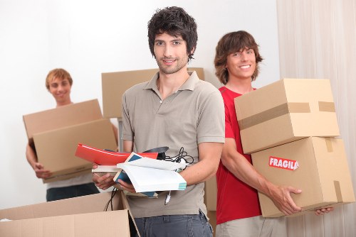 Movers loading household items for a Cricklewood relocation