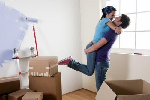 Packing boxes and loading a van for a Cricklewood move
