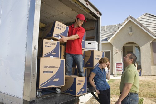 Packed office boxes and workstations ready for transport