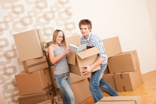 Loading furniture into a removals van in north-west London