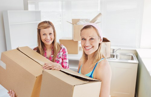 Packed boxes and furniture ready for house removals