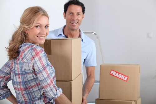 Packed boxes and furniture ready for transport during removals
