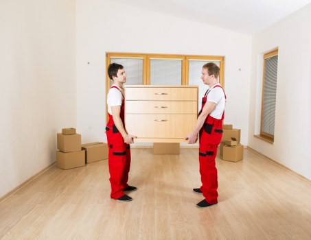 Packed boxes and furniture ready for house removals